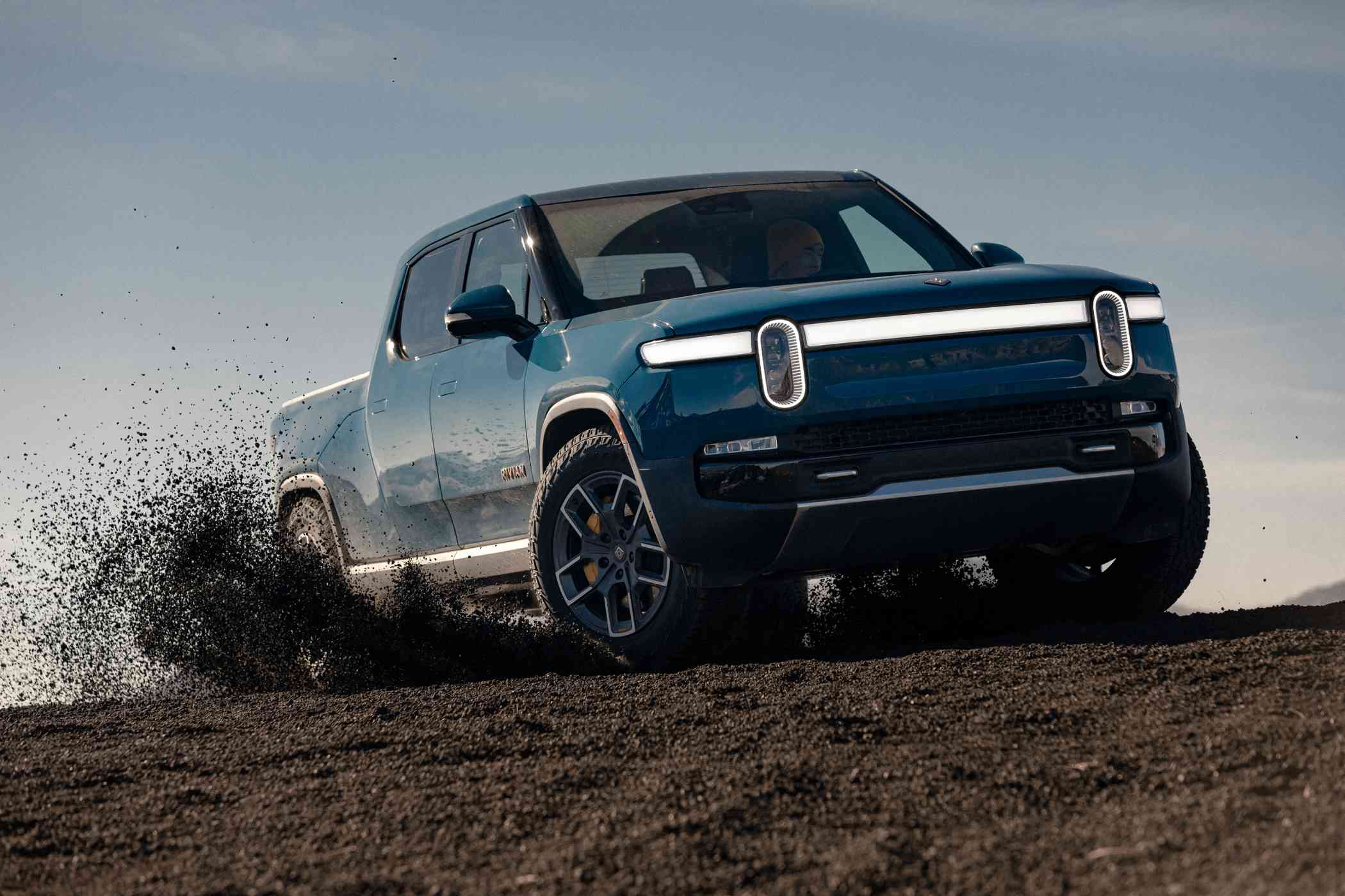 blue Rivian truck 