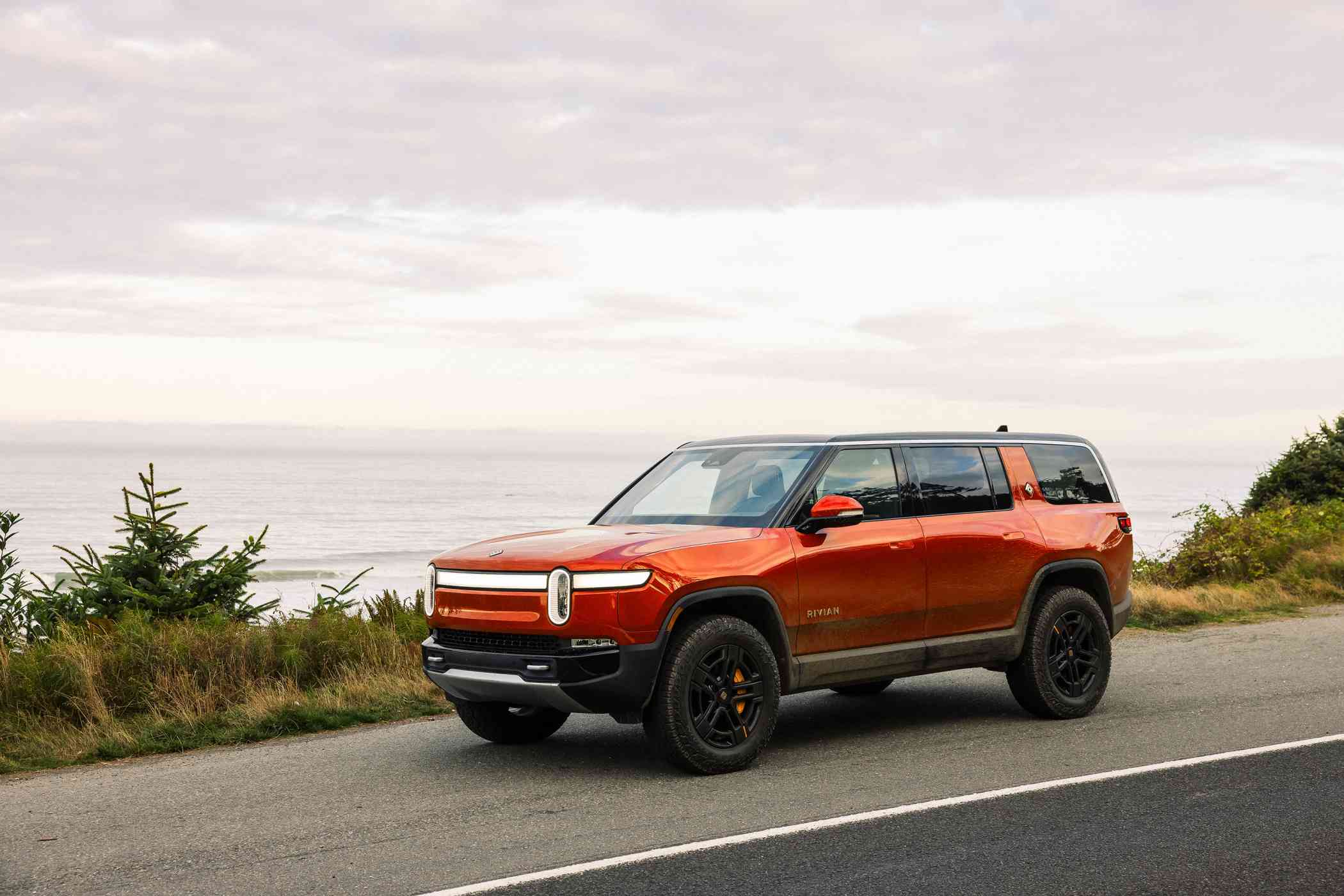 Orange rivian SUV